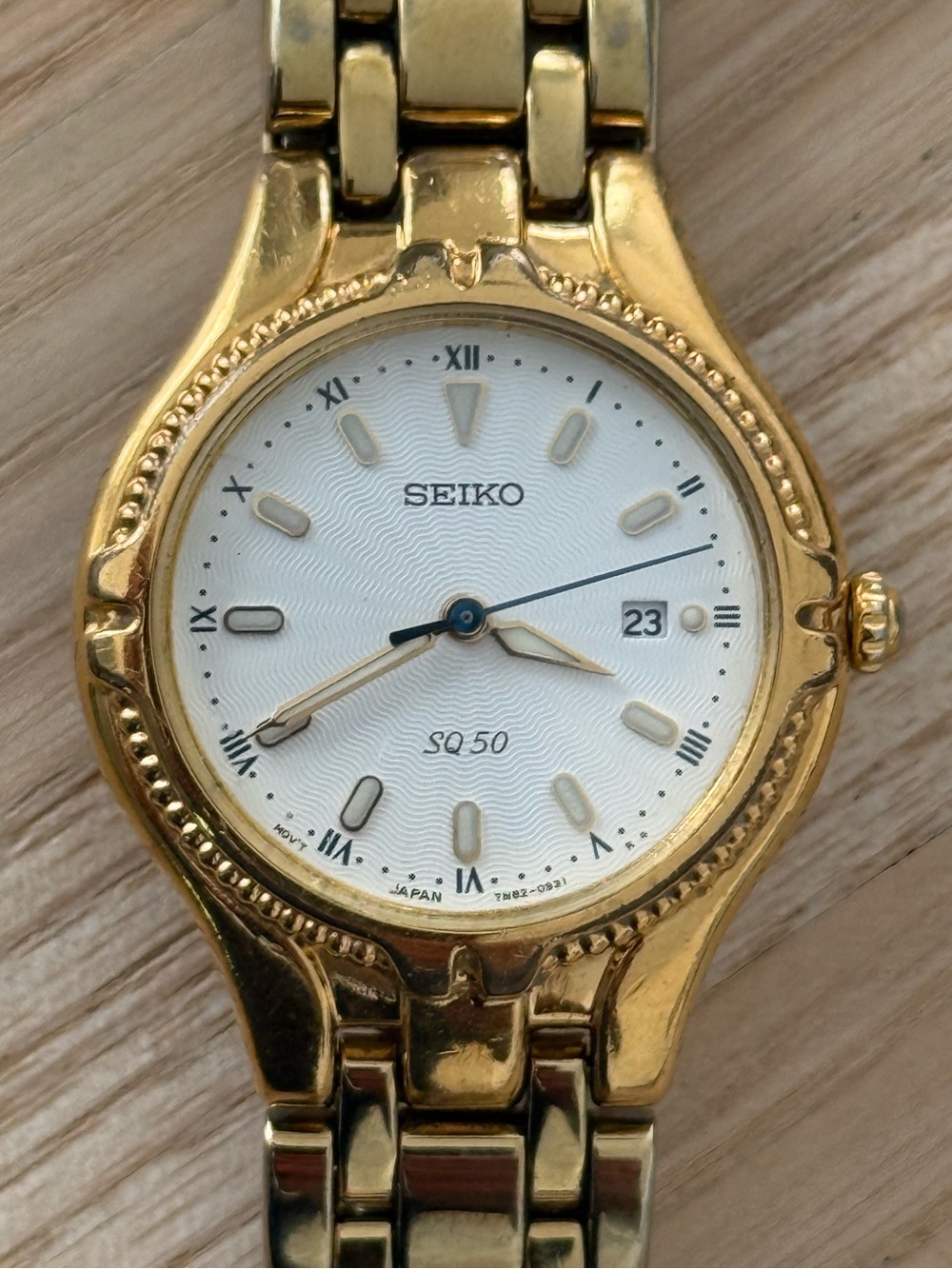 Seiko Vintage Watch Gold Bracelet Case White Dial Blue Gold Hands Date Window